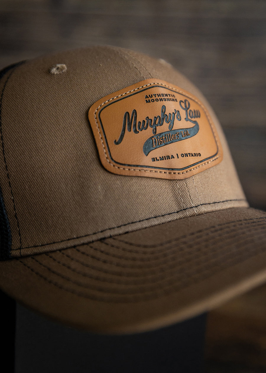Murphy's Law Distillery Vintage Script Patch Mesh Back Hat (Light Brown, Sand)